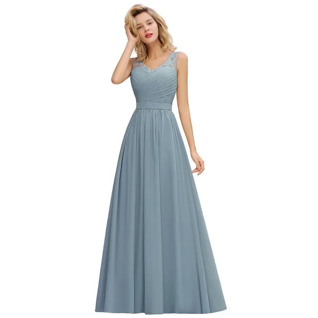 a woman in a long blue dress