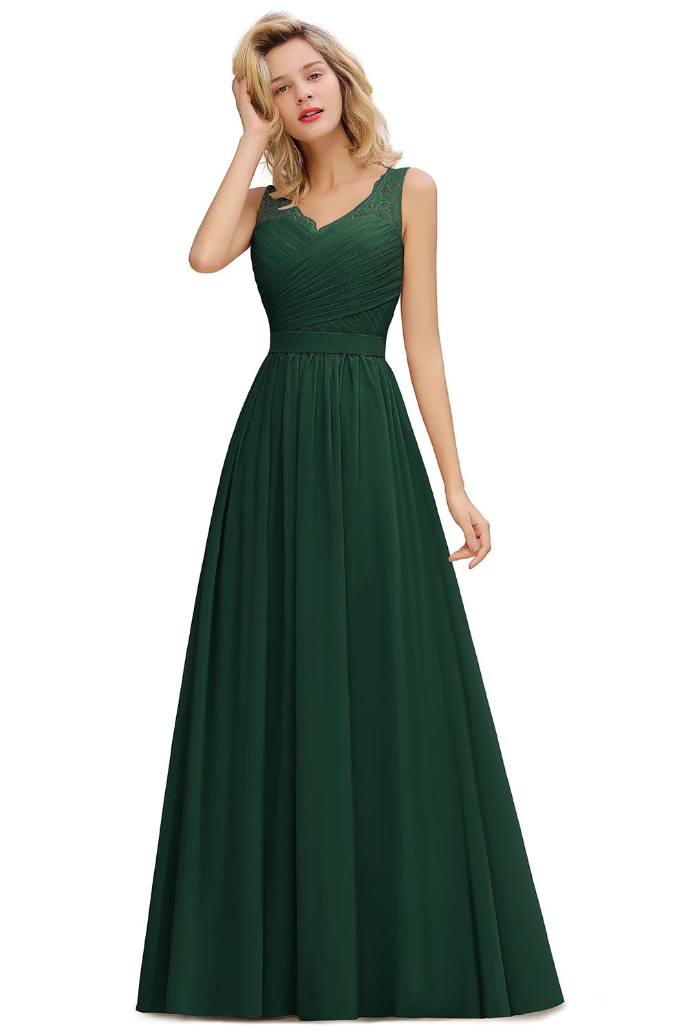 a woman in a long green dress