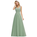 a woman in a long green dress