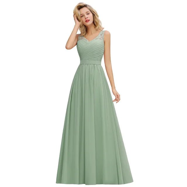 a woman in a long green dress