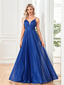 A-line spaghetti strap long flowing draped prom gown in deep blue.