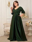 Elegant plus-size evening dress with 3/4 sleeves, sequins, navy blue.