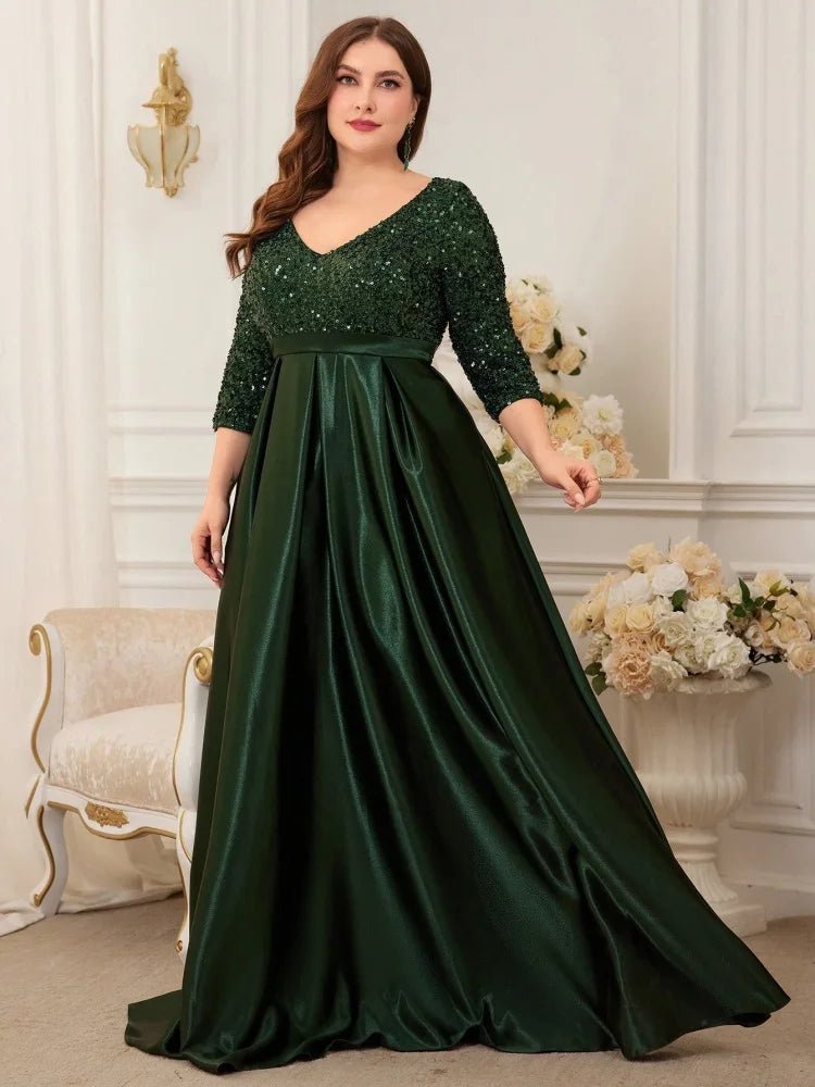 Elegant plus-size evening dress featuring 3/4 sleeves and sequins, navy.