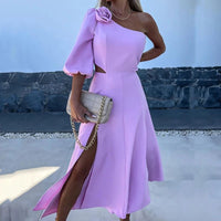 a woman wearing a purple dress with a thigh high slit