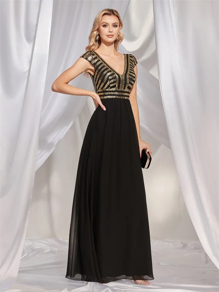 Elegant sequined cap-sleeve chiffon evening gown in navy blue, size M.