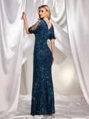 Elegant V-neck sequin mermaid evening dress with sleeves in navy blue.