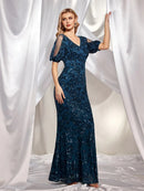 Elegant v-neck sequin mermaid evening dress in navy blue with sleeves.