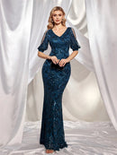 Elegant v-neck sequin mermaid evening dress in navy with long sleeves, size M.