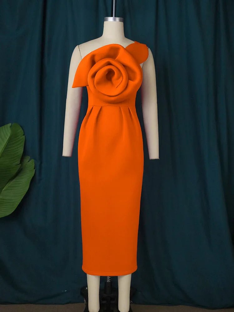 a mannequin wearing an orange dress with a flower on it