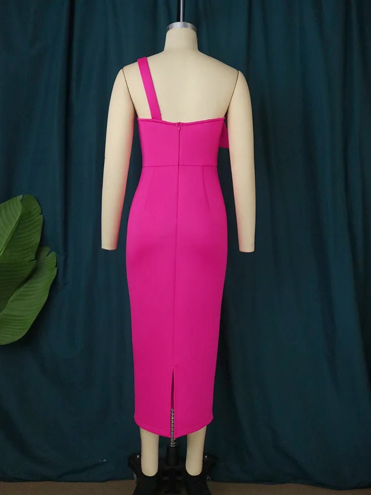 a mannequin with a pink dress on display