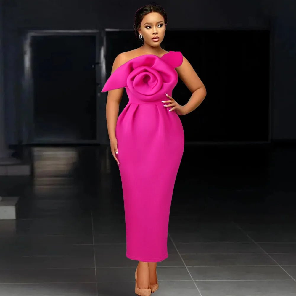 a woman in a pink dress standing on a tile floor