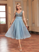 Light blue midi prom dress with rhinestones, elegant design, size M.