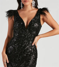 a woman wearing a black dress with feathers on it