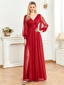 Red chiffon formal dress with V-neck, long sleeves, and high slit.