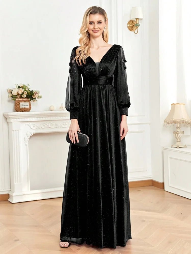 **Alt Text:** Long sleeve v-neck chiffon formal dress in navy blue with high slit.