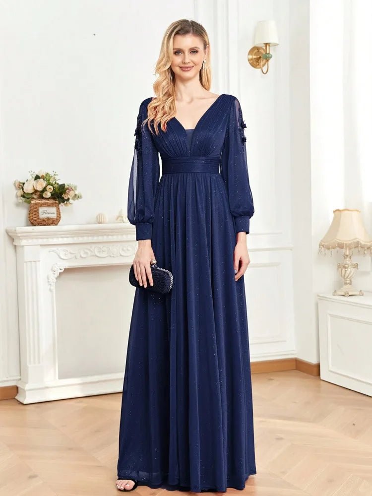 Chic navy chiffon long-sleeve formal dress with high slit, size M.