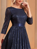 Navy blue formal evening dress, 3/4 sleeves, embellished with sequins.