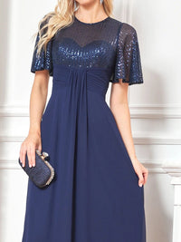 Navy short-sleeve embellished evening gown with elegant detailing.