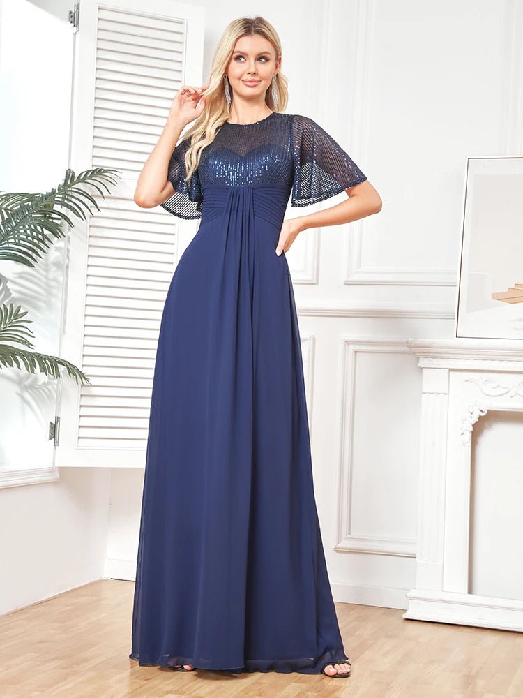 Navy short sleeve embellished evening gown with elegant design details.