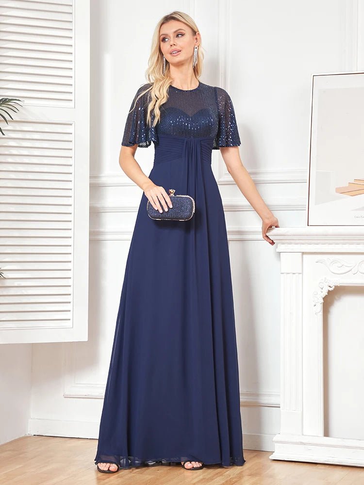 Navy short-sleeve embellished evening gown with a flowing silhouette.