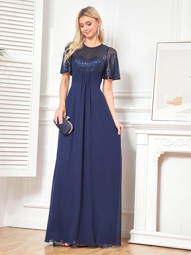 Elegant navy short sleeve embellished evening gown, size M, stunning design.