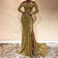 a woman in a gold dress with a slit