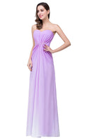 a woman in a strapless purple dress