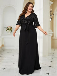 Plus size black chiffon evening dress with sequin detailing, elegant and stylish.