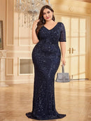 Plus-size sequin mermaid formal dress, navy blue, elegant sleeves.