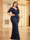 Plus size black sequined mermaid formal dress with elegant sleeves.