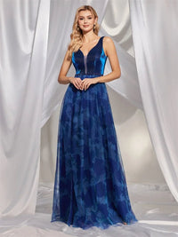 Royal blue prom dress with slits and open back, size medium, elegant design.