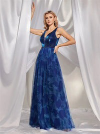 Royal blue prom dress featuring slits, open back, size M, elegant design.