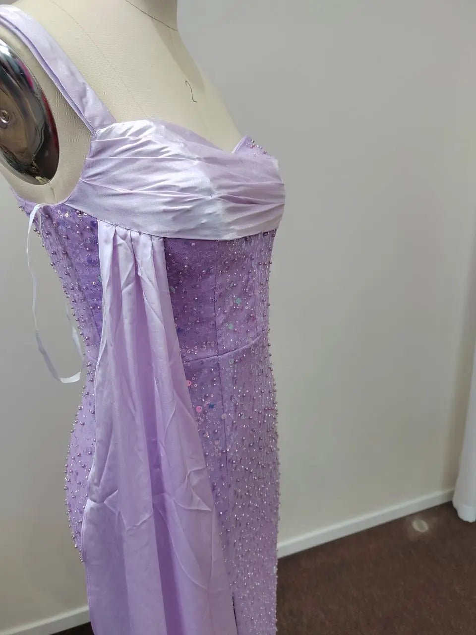 a dress on a mannequin in a room