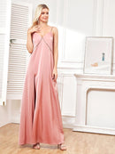 Elegant pink evening gown with side slits and spaghetti straps.