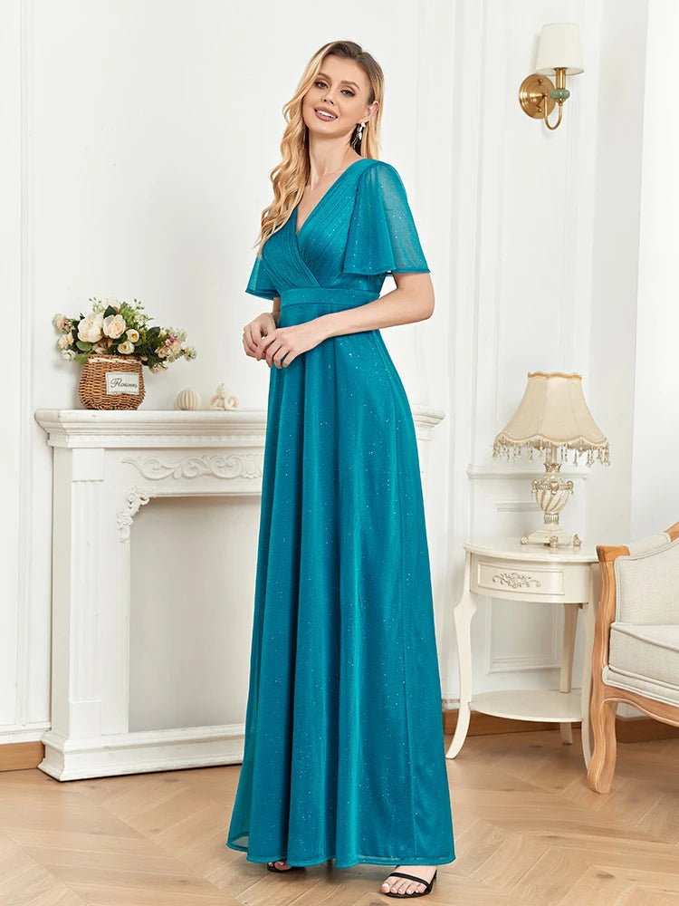 Turquoise short-sleeve evening gown with elegant design, size M.