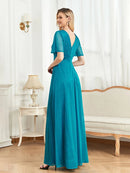 Turquoise short-sleeve elegant evening gown, size M, with a flowing design.