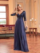 V-neck sequin formal dress with 3/4 sleeves, sparkling in navy blue.