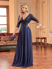 V-neck sequin formal dress, dark blue, 3/4 sleeves, elegant design.