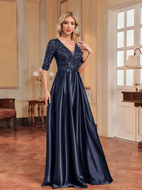 V-neck sequined A-line satin dress in navy, size medium, elegant formal wear.